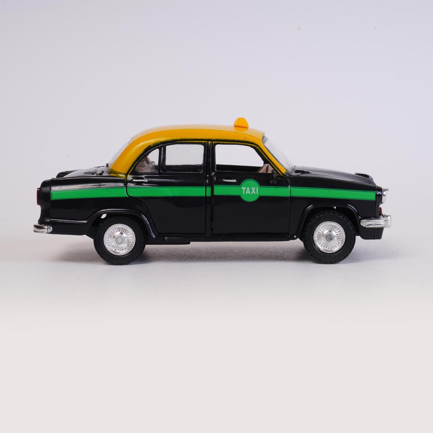 Ambassador Taxi (AIG-075) – Pull-Back Mini Taxi Toy