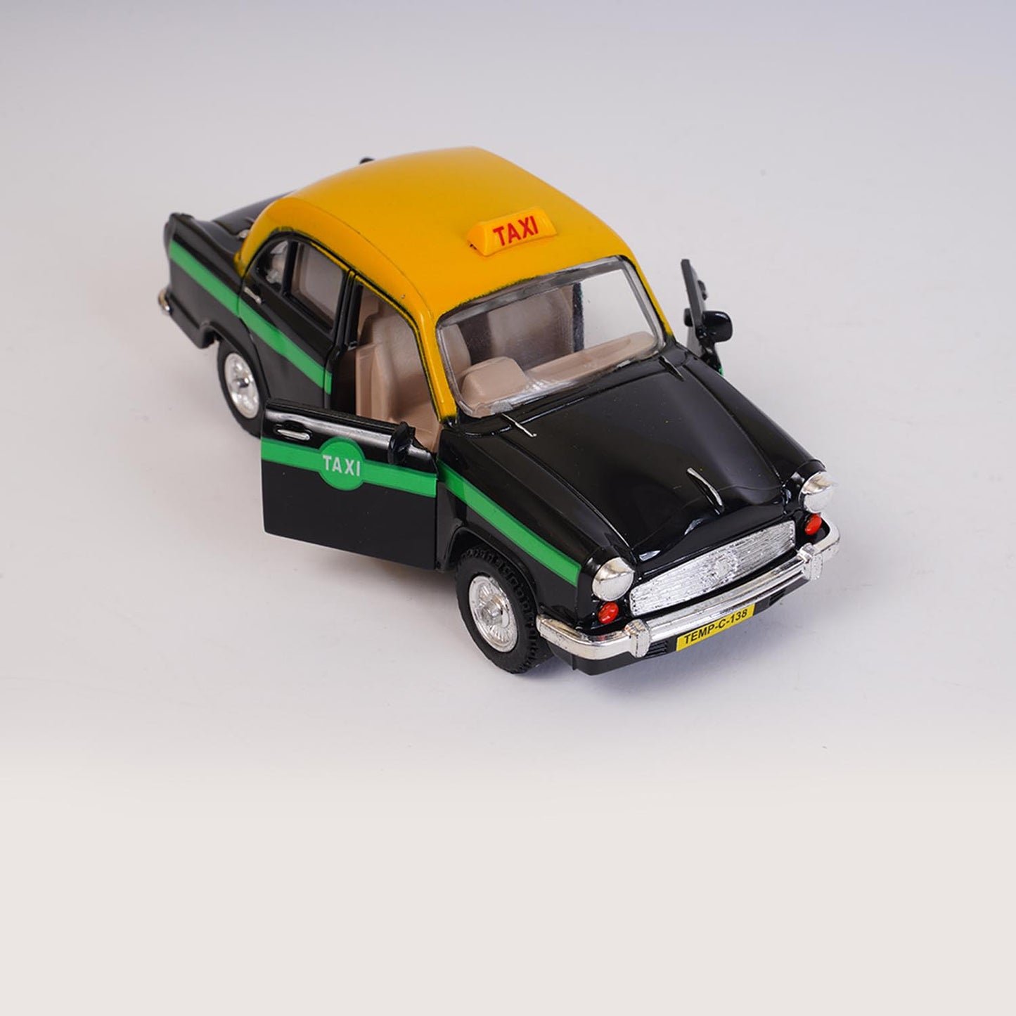 Ambassador Taxi (AIG-075) – Pull-Back Mini Taxi Toy