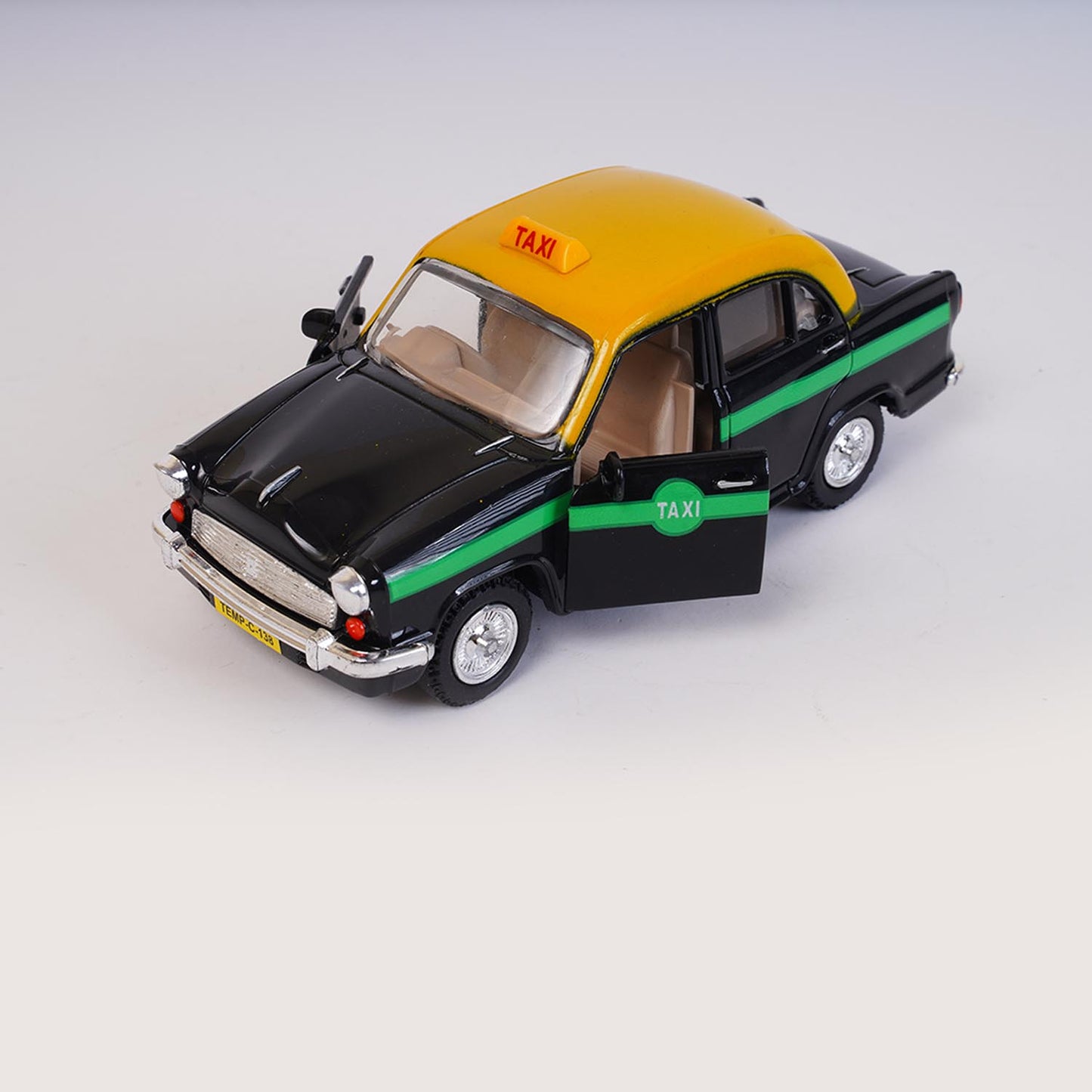Ambassador Taxi (AIG-075) – Pull-Back Mini Taxi Toy